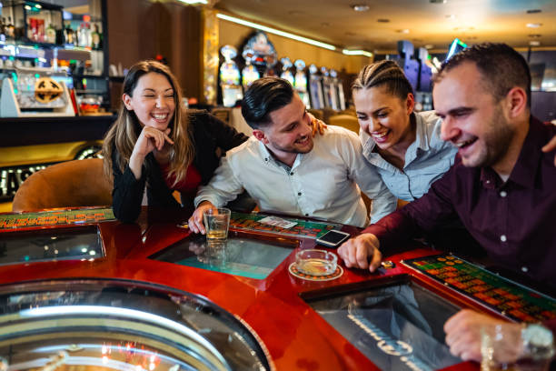 Live dealer studio with card and roulette tables